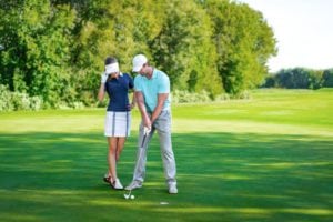 A-couple-playing-golf-together